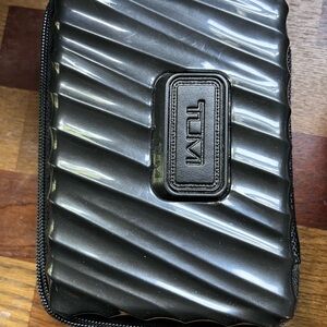 TUMI Glossy Black Travel Pouch
